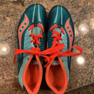 Running shoes with spikes